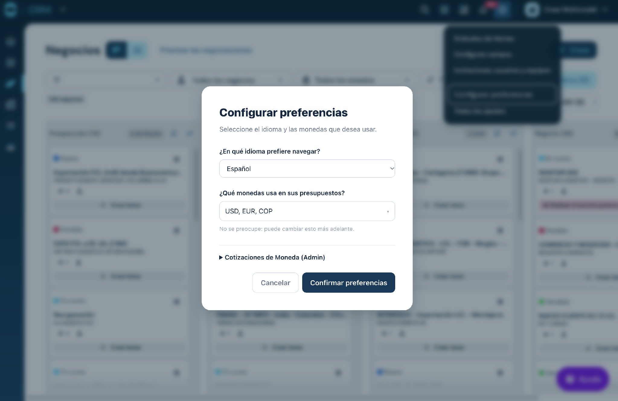 Tela de configuração RD Global: usuário seleciona idioma de navegação (Español) e moedas das propostas (USD, EUR, COP) dentro do RD Station CRM